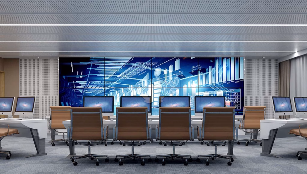 A modern control room with rows of brown chairs and computer monitors faces a large digital display wall showing graphs, data, and futuristic blue graphics—perfect inspiration for your own high-tech studio unit for sale.