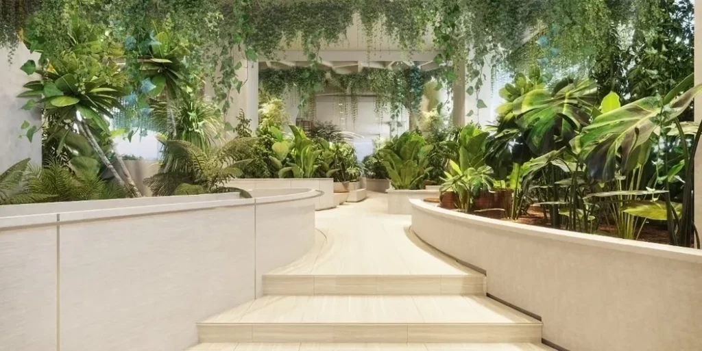 Indoor garden with lush green plants and vines, perfect for a studio apartment for those seeking serenity. Curved pathways and light-colored stone steps create a bright, tranquil atmosphere ideal for relaxed living.