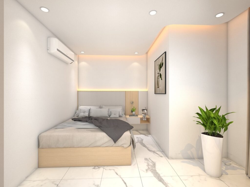 Minimalist bedroom with a beige bed, gray bedding, a wall-mounted nightstand, framed plant artwork, potted plant, marble tile floor, and soft recessed lighting on white walls and ceiling.